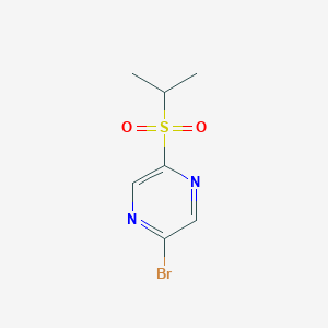 molecular formula C7H9BrN2O2S B8369219 2-Bromo-5-isopropylsulfonyl-pyrazine 