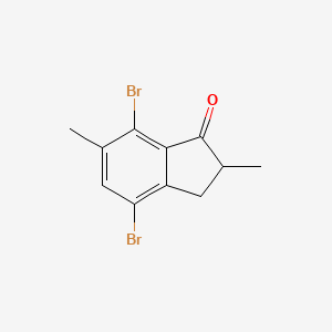 molecular formula C11H10Br2O B8380350 4,7-Dibromo-2,6-dimethyl-1-indanone 
