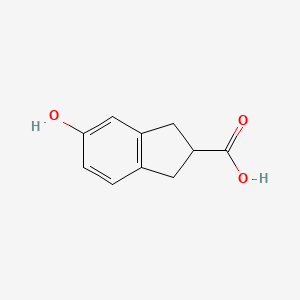 molecular formula C10H10O3 B8383453 5-Hydroxyindane-2-carboxylic Acid 