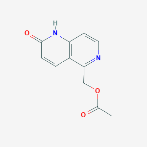 molecular formula C11H10N2O3 B8390569 5-[(acetyloxy)methyl]-1,6-naphthyridin-2(1H)-one 