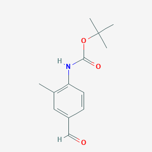 molecular formula C13H17NO3 B8394674 4-[[(1,1-Dimethylethoxy)carbonyl]amino]-3-methylbenzaldehyde 