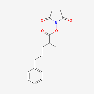 molecular formula C16H19NO4 B8396462 (+/-)-2,5-Dioxopyrrolidin-1-yl 2-methyl-5-phenylpentanoate 