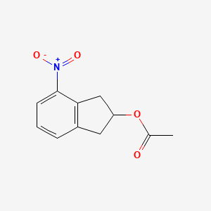4-nitro-2,3-dihydro-1H-inden-2-yl acetate