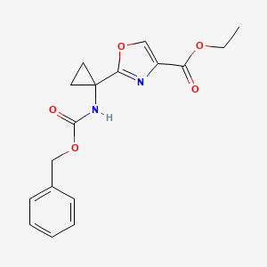 molecular formula C17H18N2O5 B8409842 2-(1-Benzyloxycarbonylamino-cyclopropyl)-oxazole-4-carboxylic acid ethyl ester 