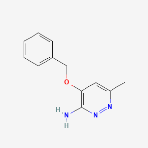 molecular formula C12H13N3O B8413768 3-Amino-6-methyl-4-phenylmethoxypyridazine 