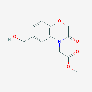 molecular formula C12H13NO5 B8417377 Methyl-[6-(hydroxymethyl)-3-oxo-2,3-dihydro-4h-1,4-benzoxazin-4-yl]acetate 
