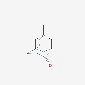 molecular formula C12H18O B8422384 1,3-Dimethyl-4-adamantanone 