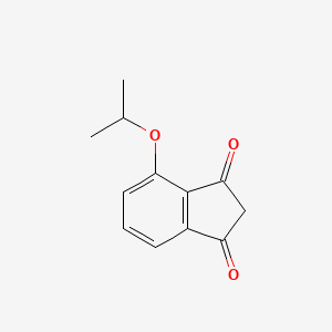 molecular formula C12H12O3 B8422618 4-Isopropyloxy indane-1,3-dione 