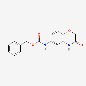 molecular formula C16H14N2O4 B8425772 (3-Oxo-3,4-dihydro-2h-benzo[1,4]oxazin-6-yl)-carbamic acid benzyl ester 