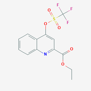 molecular formula C13H10F3NO5S B8430730 Ethyl 4-(((trifluoromethyl)sulfonyl)oxy)quinoline-2-carboxylate 