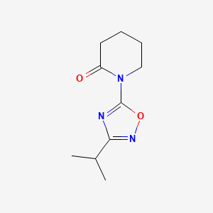 molecular formula C10H15N3O2 B8430845 1-(3-Isopropyl-[1,2,4]oxadiazol-5-yl)-piperidin-2-one 