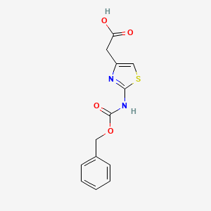 molecular formula C13H12N2O4S B8434701 (2-Benzyloxycarbonylaminothiazol-4-yl)acetic acid 