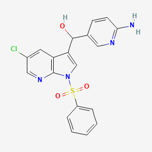 molecular formula C19H15ClN4O3S B8435065 (6-Aminopyridin-3-yl)(5-chloro-1-(phenylsulfonyl)-1H-pyrrolo[2,3-b]pyridin-3-yl)methanol CAS No. 1029052-73-0