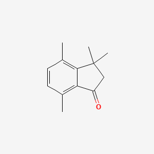 molecular formula C13H16O B8439195 3,3,4,7-Tetramethyl-1-indanone 