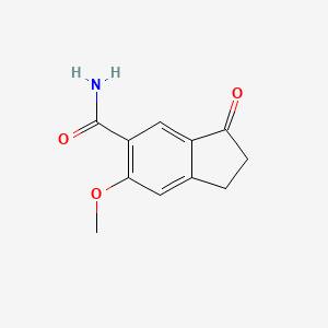 molecular formula C11H11NO3 B8443569 6-Methoxy-3-oxo-indan-5-carboxylic acid amide 