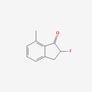 molecular formula C10H9FO B8454253 2-Fluoro-7-methyl-2,3-dihydro-1H-inden-1-one 