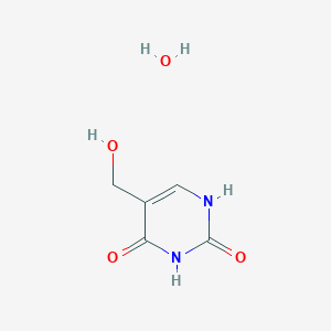 molecular formula C5H8N2O4 B8462843 5-(Hydroxymethyl)-uracil hydrate 
