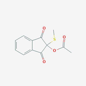 1,3-Indandione, 2-hydroxy-2-methylthio-, acetate