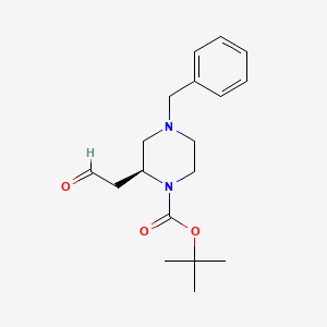 Tert-butyl (S)-4-benzyl-2-(2-oxoethyl)piperazine-1-carboxylate