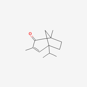 molecular formula C13H20O B8488571 5-Isopropyl-1,3-dimethyl-bicyclo[3.2.1]oct-3-en-2-one 
