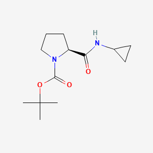 molecular formula C13H22N2O3 B8494756 (S)-2-Cyclopropylcarbamoyl-pyrrolidine-1-carboxylic acid tert-butyl ester 