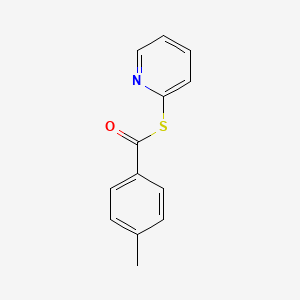 molecular formula C13H11NOS B8497111 Benzenecarbothioic acid, 4-methyl-, S-2-pyridinyl ester CAS No. 74032-45-4