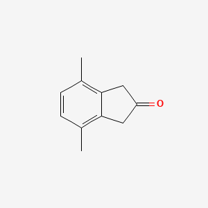 molecular formula C11H12O B8510410 4,7-Dimethyl-2-indanone 