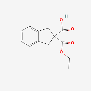 molecular formula C13H14O4 B8511066 2-(Ethoxycarbonyl)indane-2-carboxylic acid 