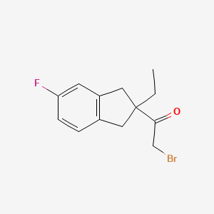 molecular formula C13H14BrFO B8511357 2-Bromo-1-(2-ethyl-5-fluoro-indan-2-yl)-ethanone 