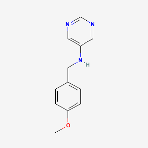 molecular formula C12H13N3O B8513271 5-(N-(4-Methoxybenzyl))aminopyrimidine 