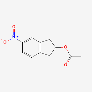 molecular formula C11H11NO4 B8523291 2-Acetoxy-5-nitroindane 