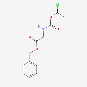 molecular formula C12H14ClNO4 B8536176 Benzyl 2-((1-chloroethoxy)carbonylamino)acetate 