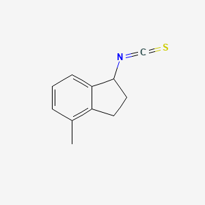 molecular formula C11H11NS B8536552 1-Isothiocyanato-4-methyl-indane 