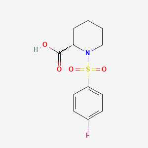 molecular formula C12H14FNO4S B8539926 (2S)-1-[(4-fluorophenyl)sulfonyl]-2-piperidinecarboxylic acid 