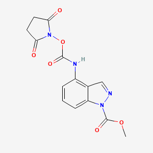 molecular formula C14H12N4O6 B8539938 Methyl 4-[(2,5-dioxopyrrolidin-1-yl)oxycarbonylamino]indazole-1-carboxylate 