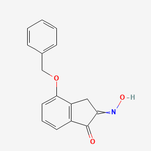 molecular formula C16H13NO3 B8540082 4-(Benzyloxy)-2-(hydroxyimino)-2,3-dihydro-1H-inden-1-one CAS No. 87427-46-1