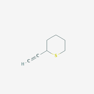 molecular formula C7H10S B008549 2-Ethynylthiane CAS No. 108277-04-9