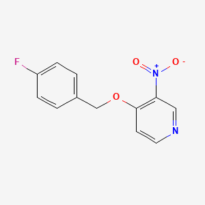 4-[(4-Fluorophenyl)methoxy]-3-nitropyridine