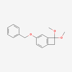 molecular formula C17H18O3 B8563812 5-(Benzyloxy)-1,1-dimethoxy-1,2-dihydrocyclobutabenzene 