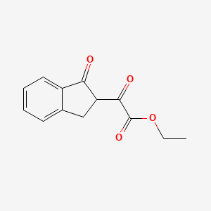 molecular formula C13H12O4 B8564318 2-Oxo-2-(1-oxoindan-2-yl)acetic acid ethyl ester 