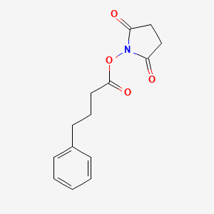 molecular formula C14H15NO4 B8567915 1-[(4-Phenylbutanoyl)oxy]pyrrolidine-2,5-dione CAS No. 88556-26-7