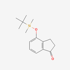 molecular formula C15H22O2Si B8574567 4-{[tert-Butyl(dimethyl)silyl]oxy}-2,3-dihydro-1H-inden-1-one CAS No. 119229-09-3