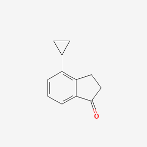 molecular formula C12H12O B8574891 (64A) 4-Cyclopropylindan-1-one 