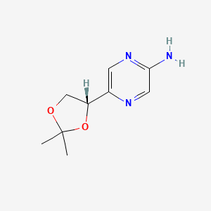 molecular formula C9H13N3O2 B8576669 5-((S)-2,2-dimethyl-[1,3]dioxolan-4-yl)-pyrazin-2-ylamine 