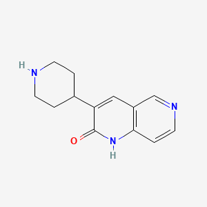 molecular formula C13H15N3O B8587781 3-(piperidin-4-yl)-1,6-naphthyridin-2(1H)-one 