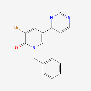 molecular formula C16H12BrN3O B8596421 1-Benzyl-3-bromo-5-(pyrimidin-4-yl)pyridin-2(1H)-one CAS No. 89996-07-6