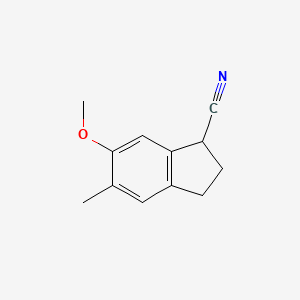 molecular formula C12H13NO B8597871 6-Methoxy-5-methyl-2,3-dihydro-1H-indene-1-carbonitrile 