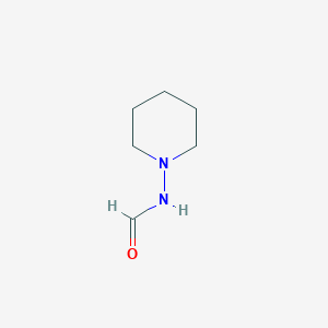 molecular formula C6H12N2O B8606107 N-(piperidin-1-yl)formamide 