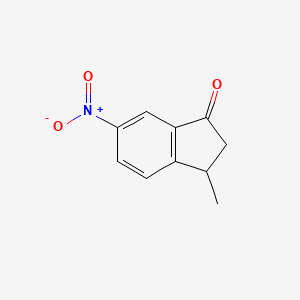 B8612122 1-Indanone, 3-methyl-6-nitro CAS No. 66248-98-4