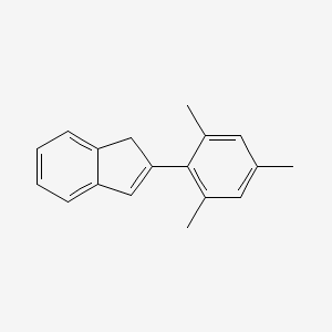 molecular formula C18H18 B8612981 2-(2,4,6-Trimethylphenyl)-1H-indene CAS No. 749870-00-6